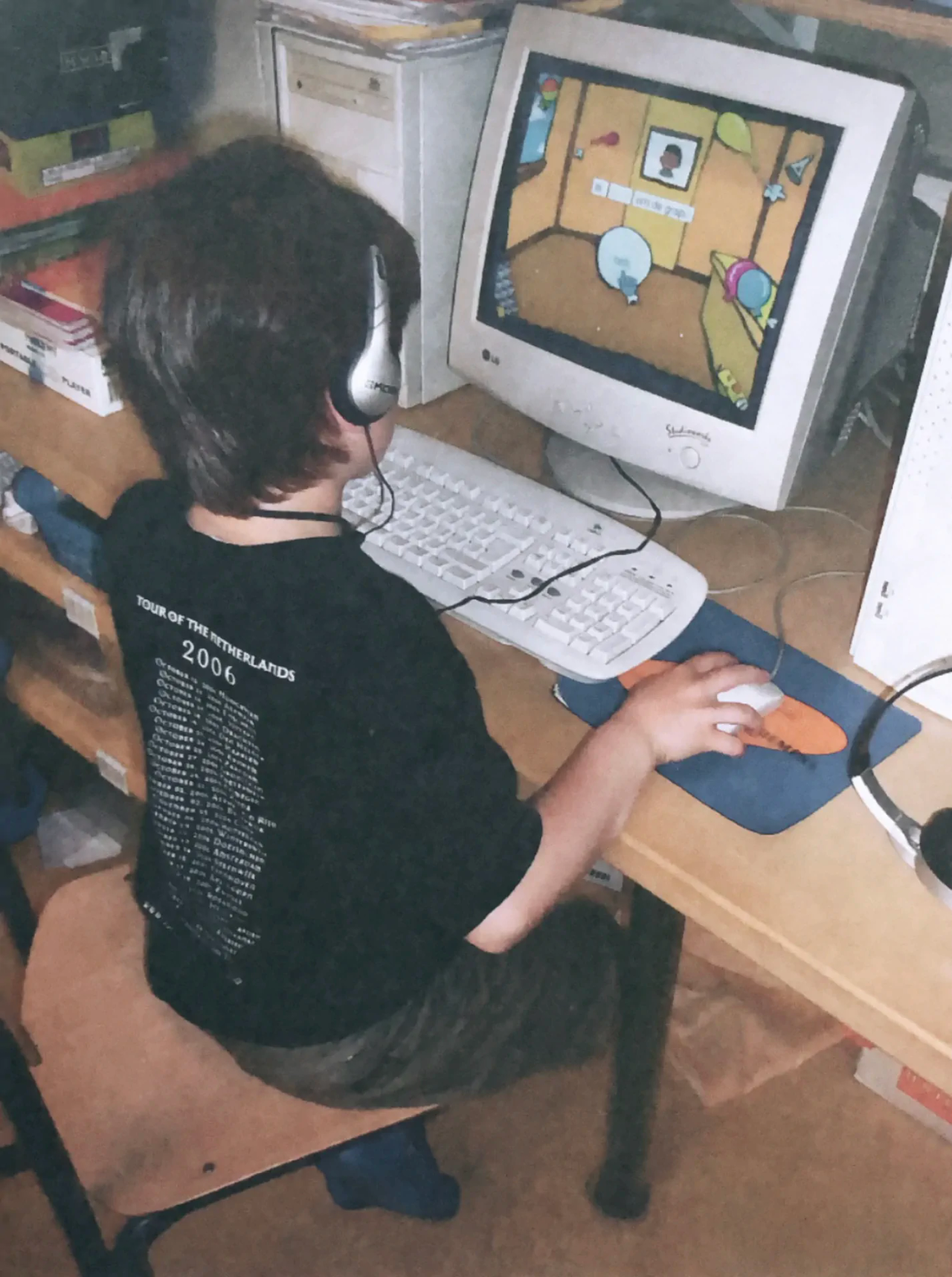 A young Didier on a computer in 2006